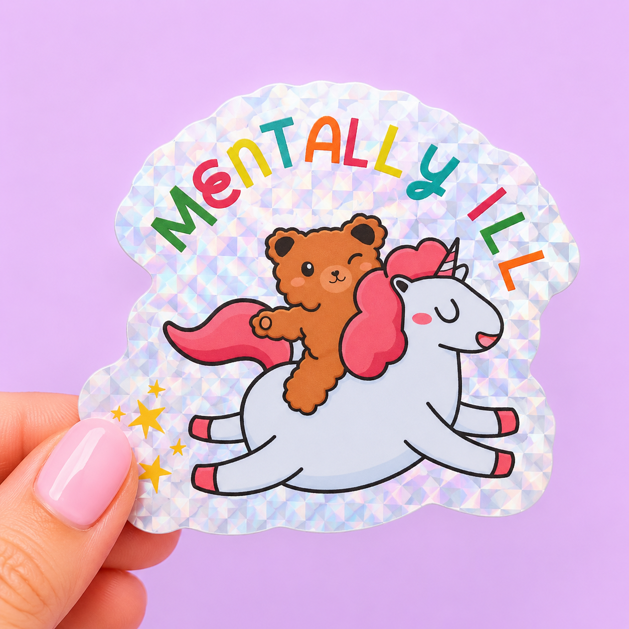 Sleazy Greetings funny die-cut vinyl sticker featuring a teddy bear riding a unicorn beneath rainbow lettering that says ‘Mentally Ill.’ Chaotic pastel sticker with absurd cute-girl meltdown energy, sparkly holographic aesthetics, and aggressively unstable gremlin vibes.