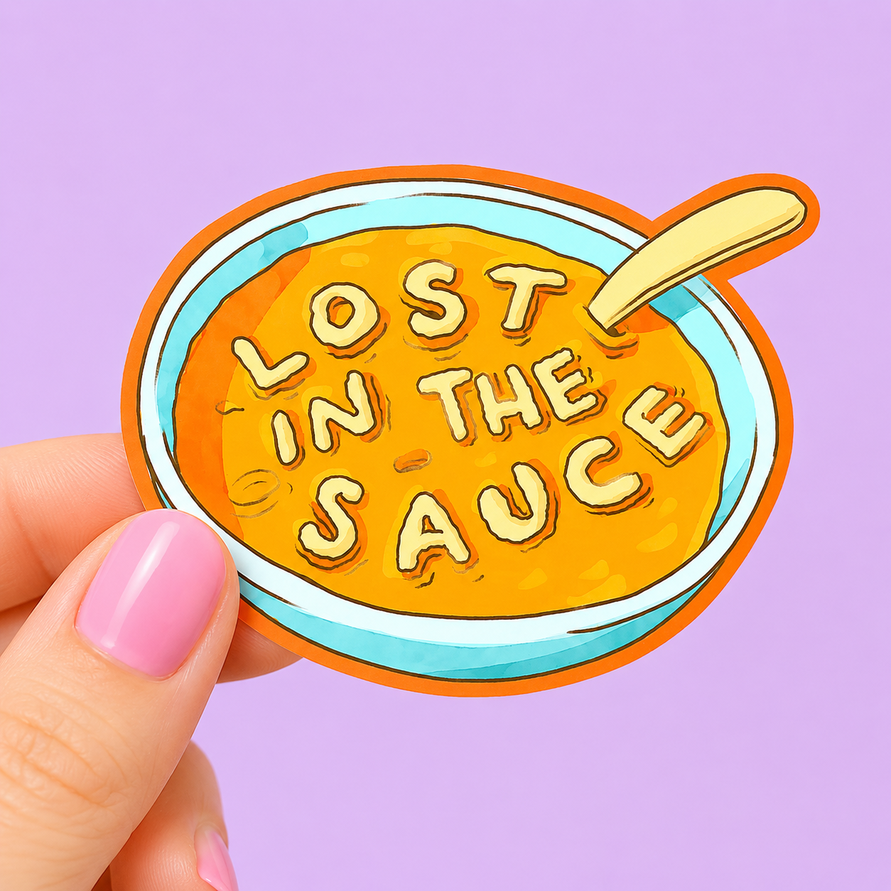 Sleazy Greetings funny die-cut vinyl sticker featuring a bowl of alphabet soup spelling out the phrase ‘Lost in the Sauce.’ Playful food pun sticker with cozy cartoon artwork, chaotic noodle humor, and bold colorful aesthetic.