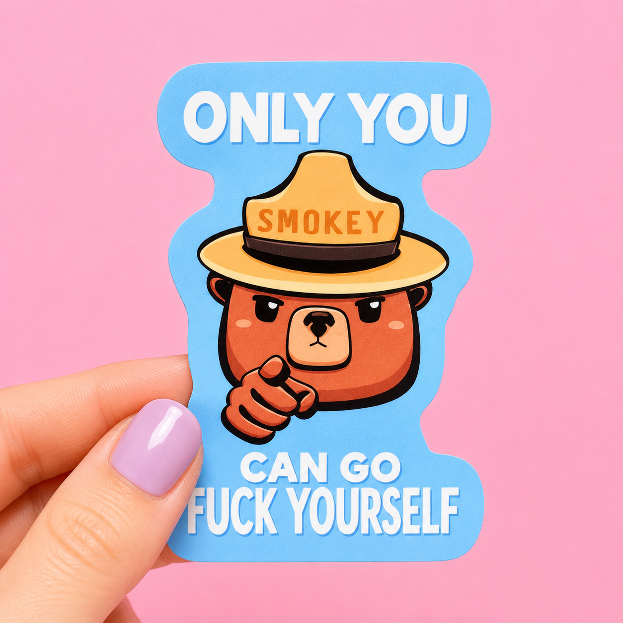 Sleazy Greetings funny die-cut vinyl sticker featuring a parody ranger bear illustration pointing forward beside the phrase ‘Only You Can Go Fuck Yourself.’ Sarcastic cartoon sticker with bold humor, pastel blue background, and playful retro-inspired aesthetic.