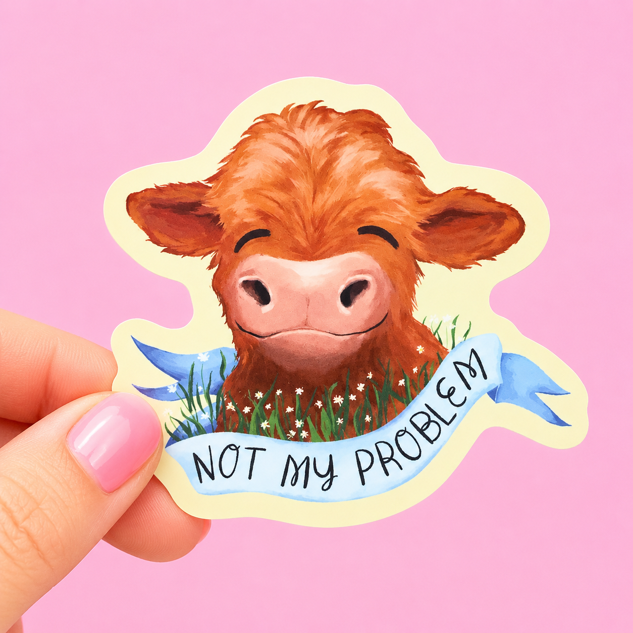 Sleazy Greetings cute die-cut vinyl sticker featuring a fluffy Highland cow beside a ribbon banner that says ‘Not My Problem.’ Cozy chaotic farm-animal sticker with soft watercolor-style artwork, emotionally detached energy, and aggressively unbothered gremlin vibes.