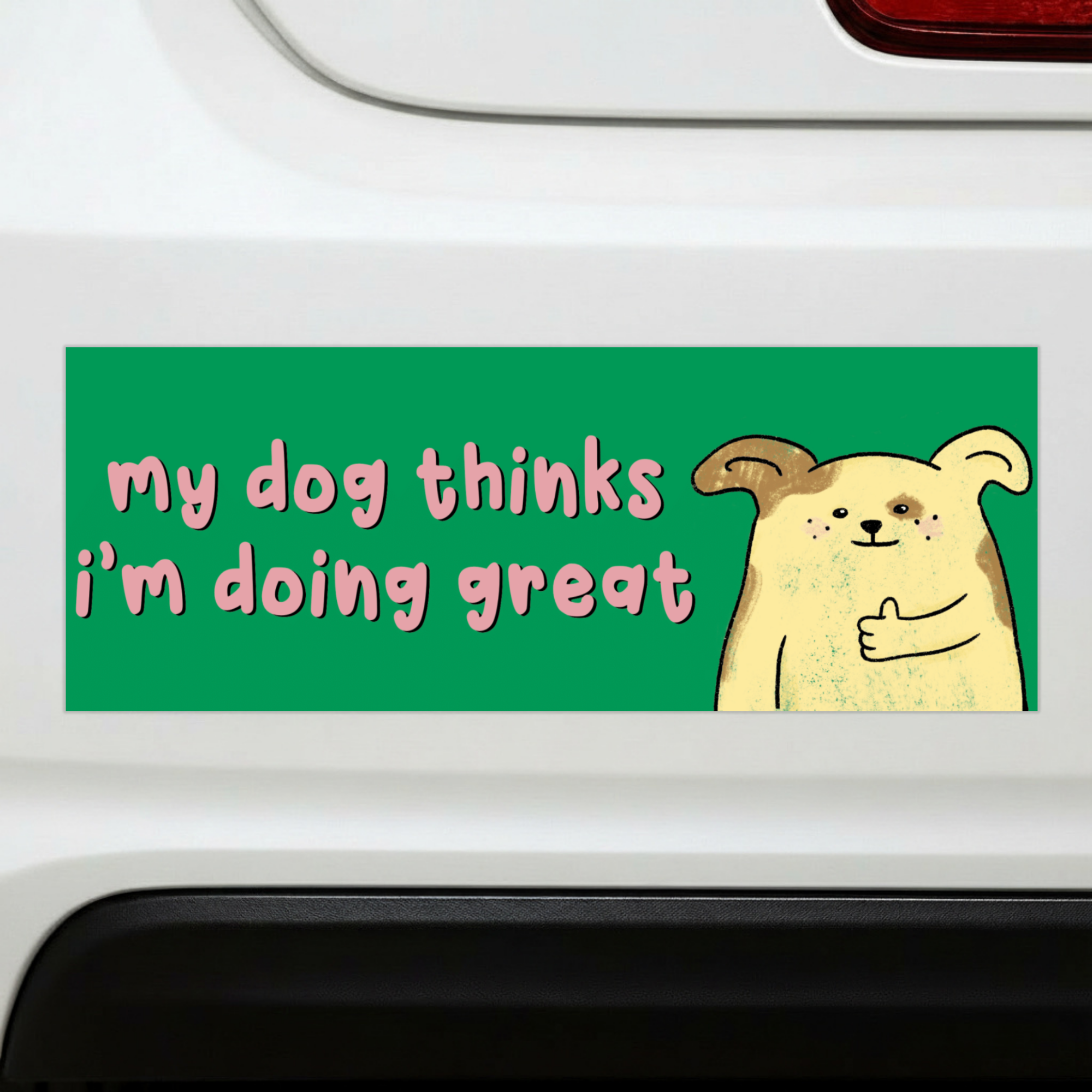 Sleazy Greetings funny bumper magnet displayed on the back of a white car featuring the phrase ‘My Dog Thinks I’m Doing Great’ alongside a cute cartoon dog giving a thumbs up on a bright green background. Humorous novelty car magnet with playful pet-owner humor and whimsical illustrated design shown in real-life automotive use.