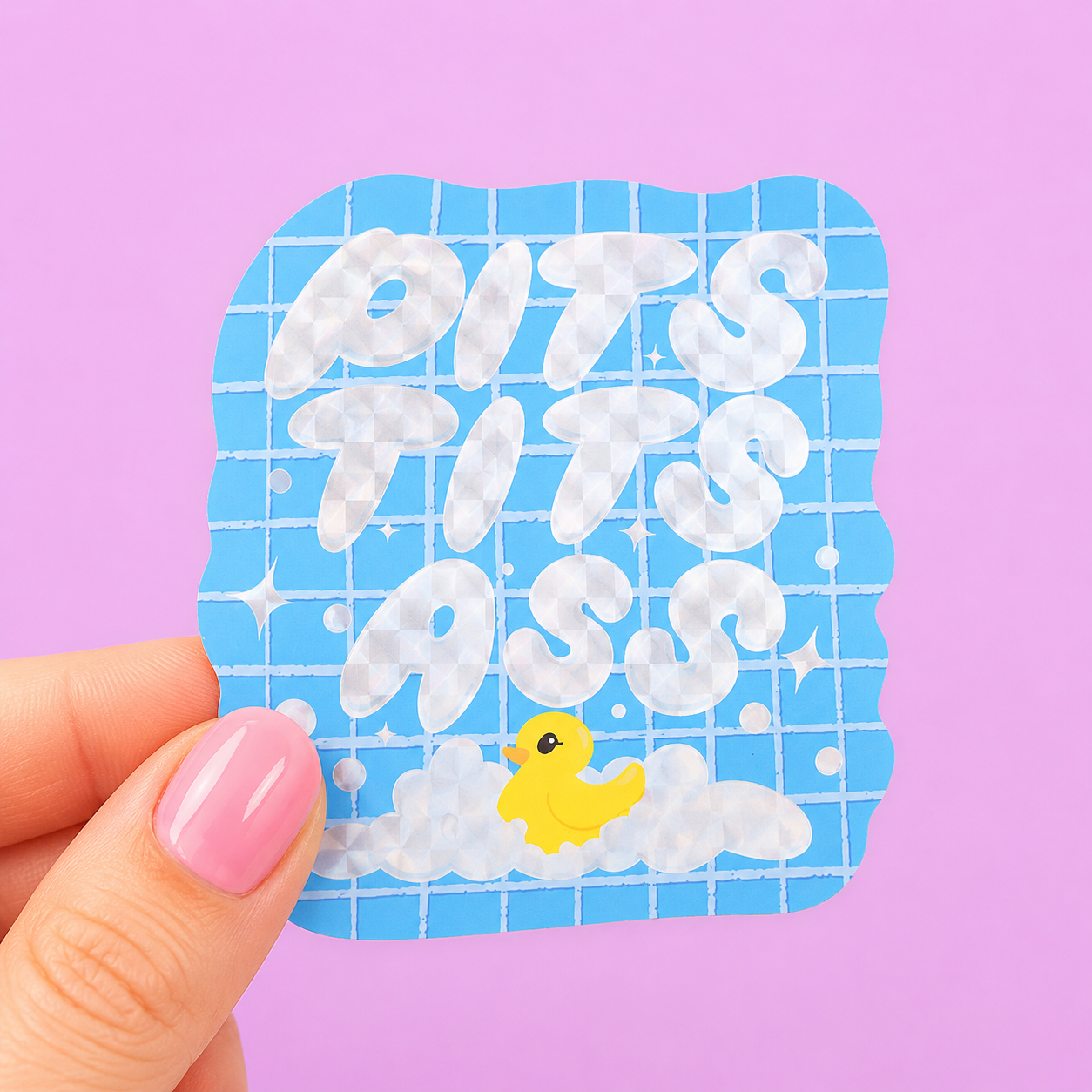 Sleazy Greetings funny die-cut vinyl sticker featuring bubbly bathhouse lettering that says ‘Pits Tits Ass’ above a tiny rubber duck in a bubbly tub. Chaotic self-care sticker with sparkly retro bath aesthetics, goofy hygiene humor, and aggressively clean gremlin energy.