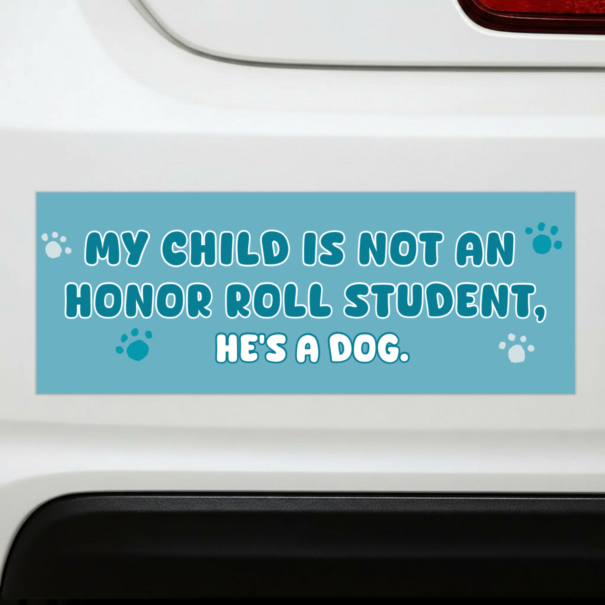 Sleazy Greetings funny bumper magnet displayed on the back of a white car, featuring the phrase ‘My Child Is Not An Honor Roll Student, He’s A Dog’ in playful white typography on a turquoise blue background with paw print accents. Humorous dog lover car magnet with cute pet-themed artwork and sarcastic parent humor aesthetic.