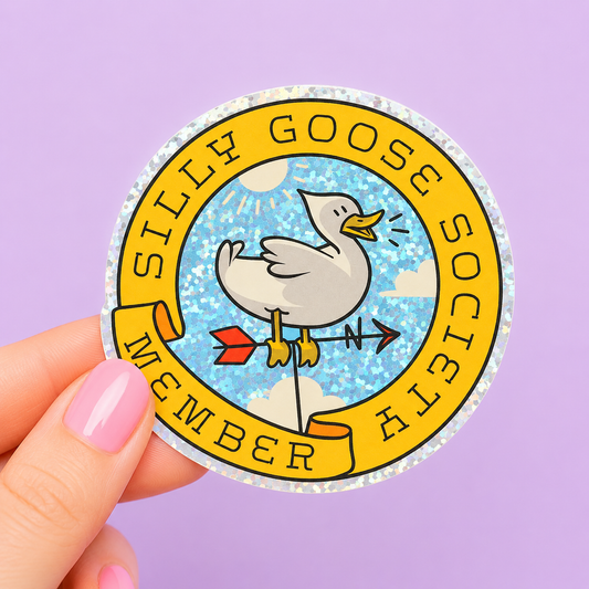 Sleazy Greetings funny holographic vinyl sticker featuring a cartoon goose weather vane inside a circular emblem reading ‘Silly Goose Society Member.’ Glittery whimsical goose sticker with vintage-inspired crest design and playful chaotic aesthetic.