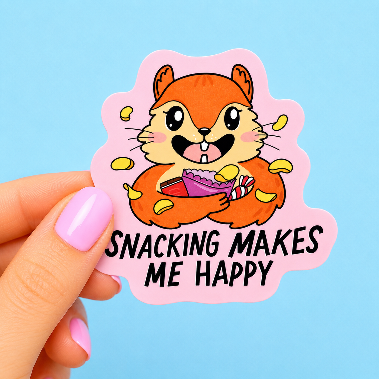 Sleazy Greetings cute die-cut vinyl sticker featuring an excited chipmunk surrounded by snacks beside the phrase ‘Snacking Makes Me Happy.’ Adorable foodie sticker with kawaii woodland artwork, cozy snack-lover vibes, and chaotic little treat energy.