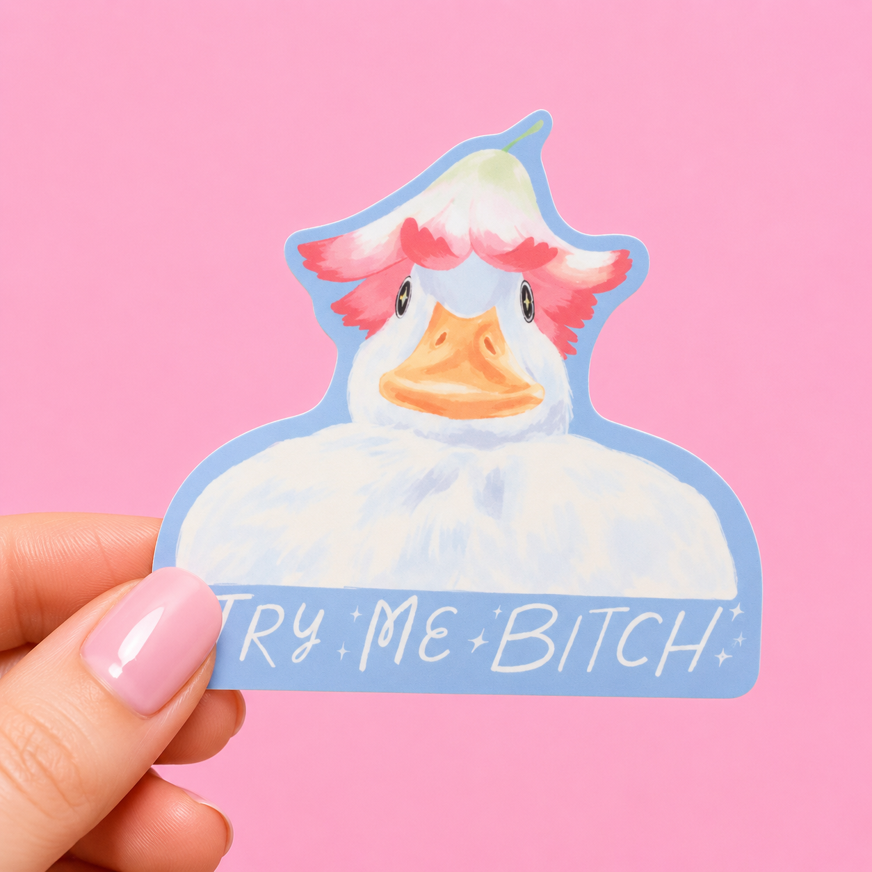 Sleazy Greetings funny die-cut vinyl sticker featuring a judgmental fluffy duck with dramatic pink feathers beside the phrase ‘Try Me, Bitch.’ Cute chaotic bird sticker with soft pastel artwork, sassy menace energy, and aggressively unbothered gremlin vibes.