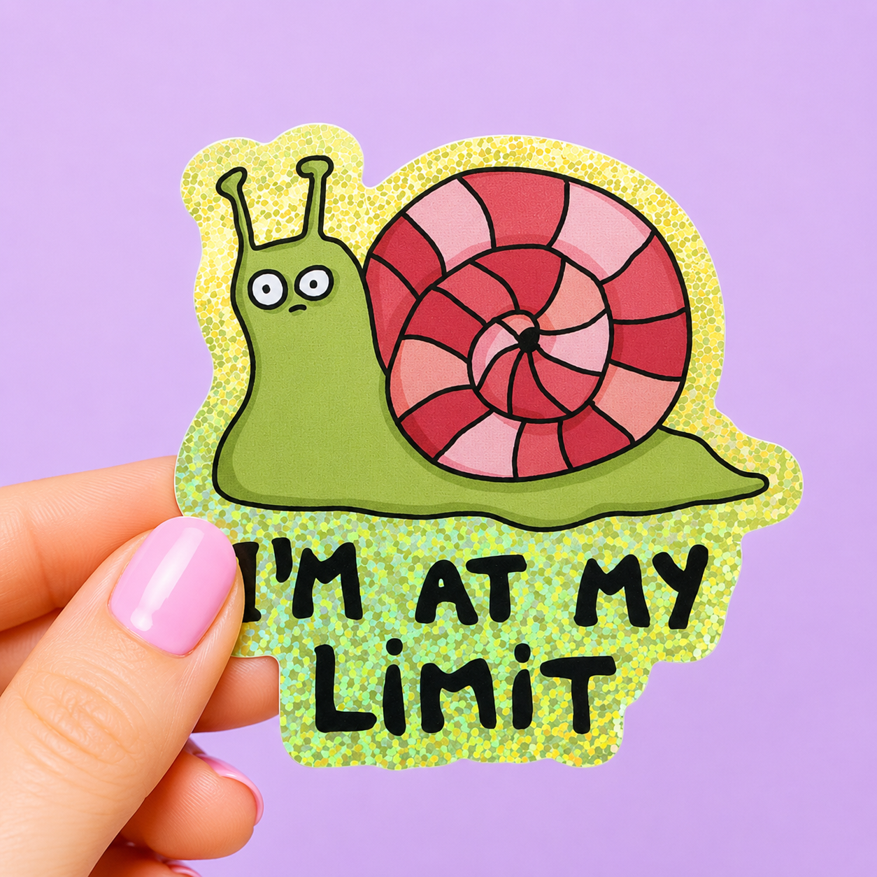 Sleazy Greetings funny holographic vinyl sticker featuring a confused cartoon snail beside the phrase ‘I’m At My Limit.’ Glittery sarcastic sticker with pastel spiral shell artwork, anxious humor, and cute chaotic aesthetic.