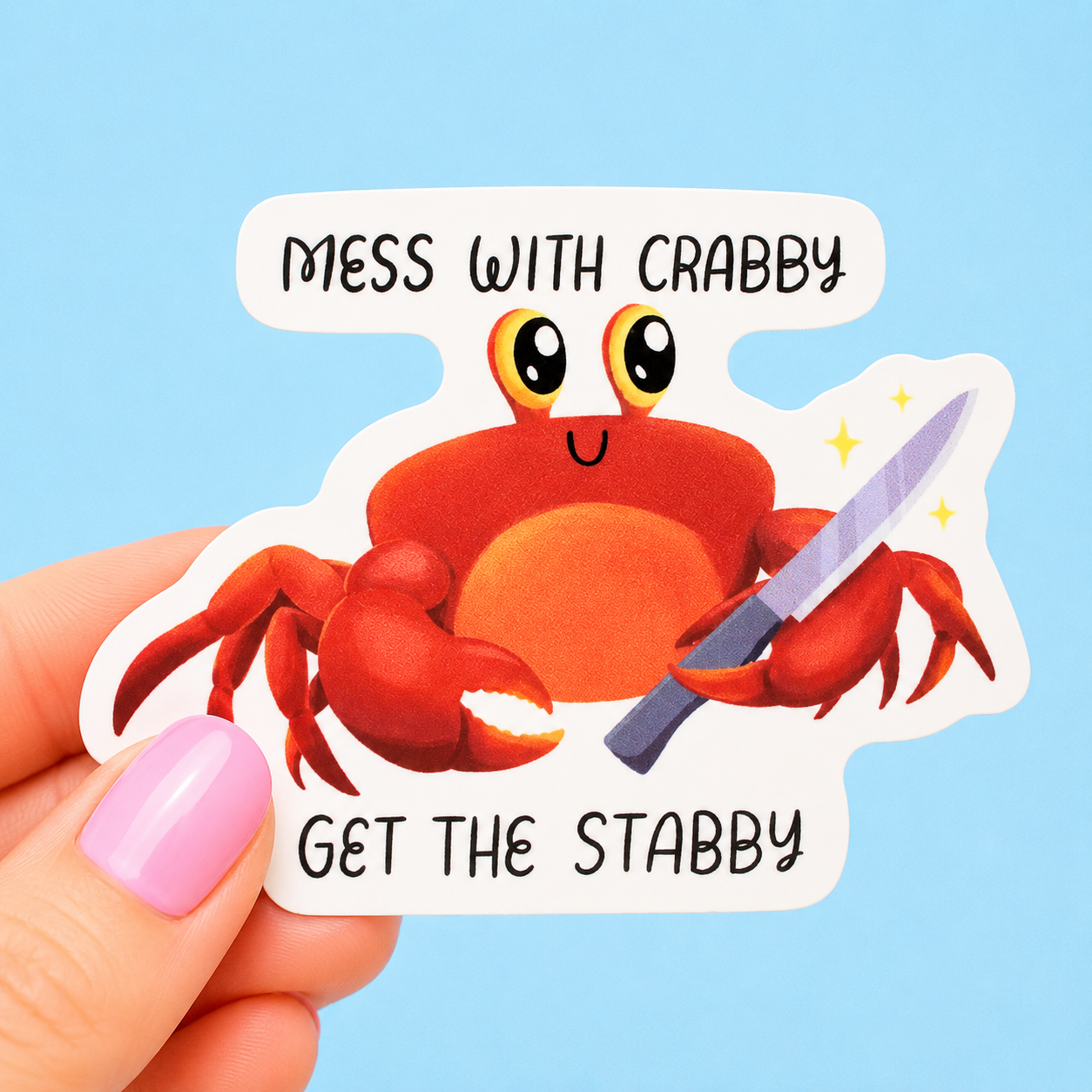 Sleazy Greetings funny die-cut vinyl sticker featuring an adorable crab holding a knife beside the phrase ‘Mess With Crabby Get the Stabby.’ Cute chaotic animal sticker with silly threat humor, kawaii crab artwork, and unhinged crustacean energy.