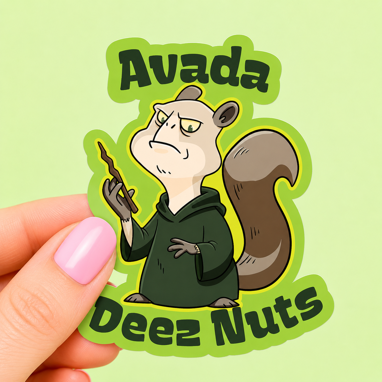 Sleazy Greetings funny die-cut vinyl sticker featuring a grumpy squirrel wizard parody holding a wand beside the phrase ‘Avada Deez Nutz.’ Nerdy fantasy meme sticker with chaotic humor, playful cartoon artwork, and magical parody aesthetic.