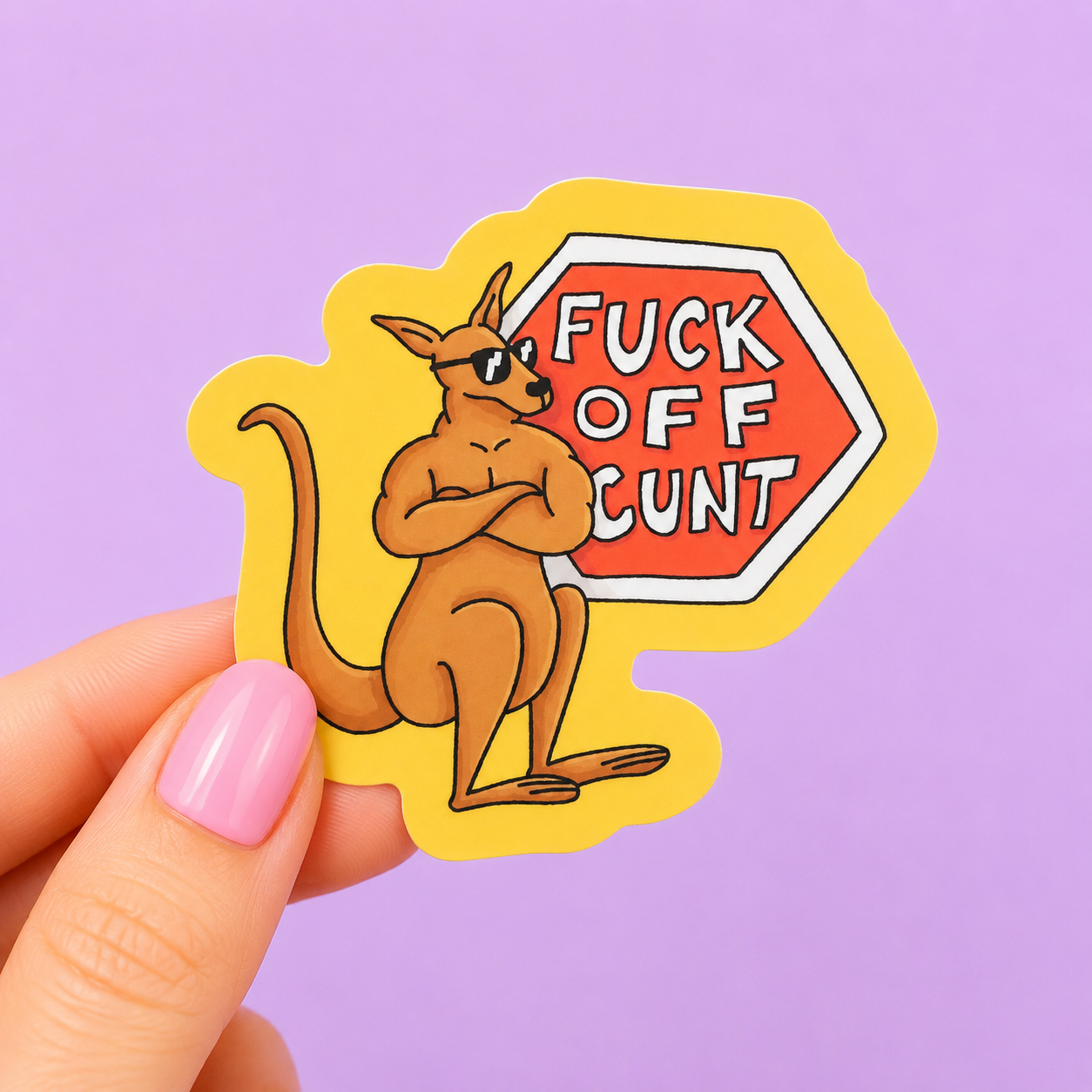 Sleazy Greetings funny die-cut vinyl sticker featuring a sunglasses-wearing cartoon kangaroo standing beside a stop sign that says ‘Fuck Off Cunt.’ Bold sarcastic sticker with Australian-inspired humor, cheeky animal artwork, and irreverent attitude.