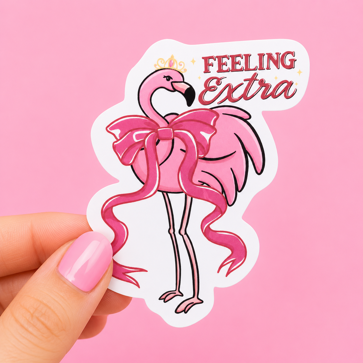 Sleazy Greetings cute die-cut vinyl sticker featuring a glamorous flamingo wearing a giant pink bow and tiara beside the phrase ‘Feeling Extra.’ Fabulous pastel sticker with diva energy, over-the-top glam vibes, and unapologetically dramatic bird humor.