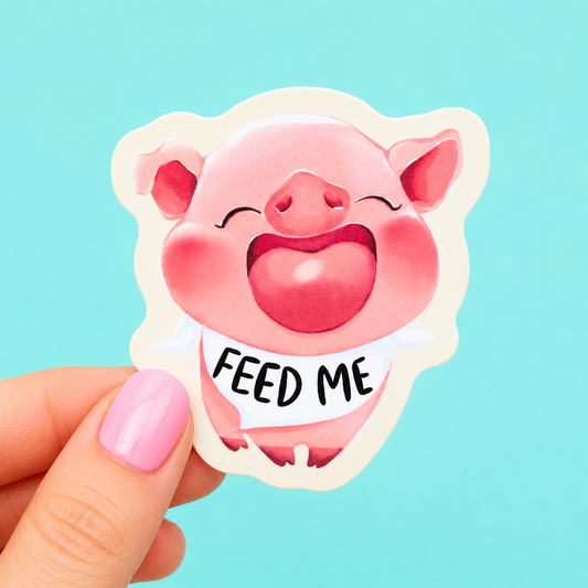 Sleazy Greetings cute die-cut vinyl sticker featuring an adorable squealing piglet wearing a bib that says ‘Feed Me.’ Kawaii-style foodie sticker with soft pastel artwork, chaotic snack-gremlin energy, and irresistibly hungry little pig vibes.
