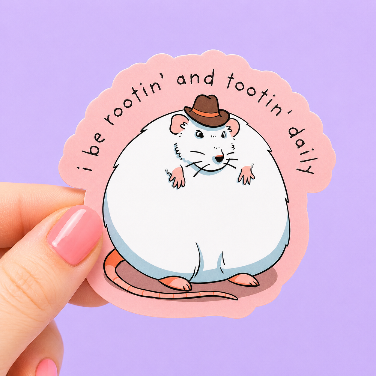 Sleazy Greetings funny die-cut vinyl sticker featuring an extremely round cartoon rat wearing a tiny cowboy hat beside the phrase ‘I Be Rootin’ and Tootin’ Daily.’ Cute chaotic rodent sticker with absurd humor, soft pastel colors, and goofy western meme aesthetic.
