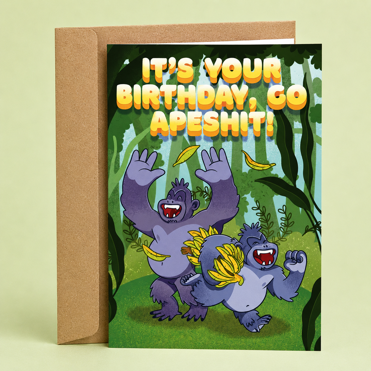 Sleazy Greetings funny birthday card featuring two excited cartoon gorillas running through a jungle while throwing bananas in the air. The card reads, “It’s Your Birthday, Go Apeshit!” in bold retro-style lettering, creating a playful and energetic birthday joke. Displayed with a kraft envelope, this humorous birthday card is perfect for friends, coworkers, siblings, teens, adults, and anyone who loves silly animal humor, monkeys, gorillas, and celebrating birthdays with chaos and laughter.