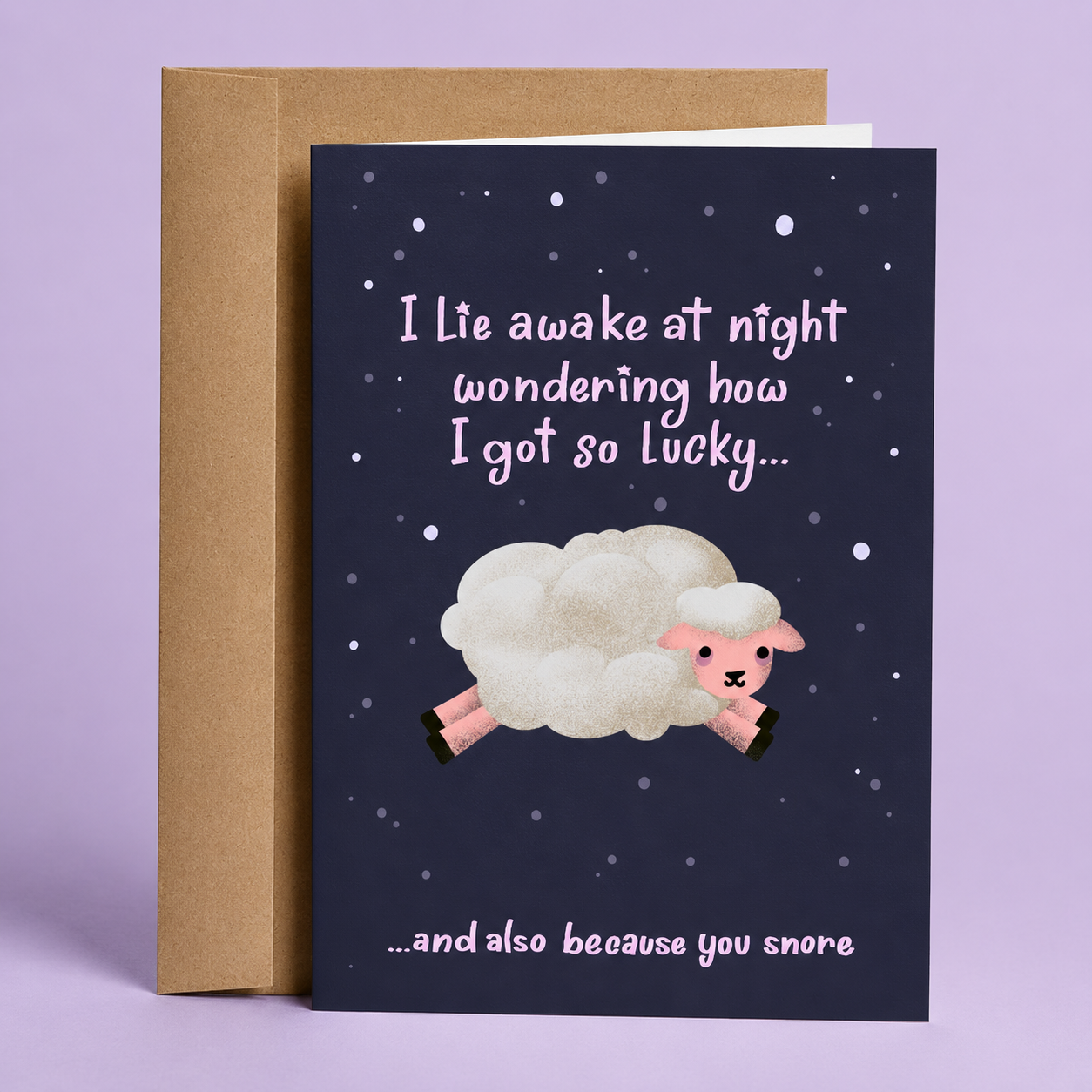 Sleazy Greetings funny love card featuring an adorable fluffy sheep jumping across a starry night sky on a dark purple background. The card reads, “I Lie Awake at Night Wondering How I Got So Lucky... and Also Because You Snore,” combining sweet romance with relatable relationship humor. Displayed with a kraft envelope, this cute and sarcastic card is perfect for a boyfriend, girlfriend, husband, wife, partner, Valentine’s Day, anniversaries, or anyone who appreciates playful jokes about life together.