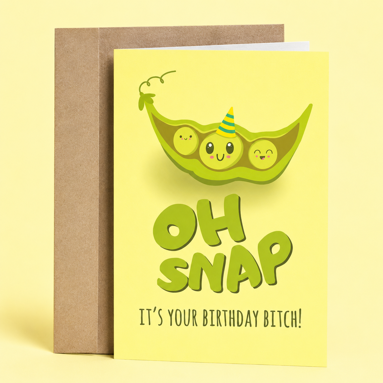 Sleazy Greetings funny birthday card featuring a smiling pea pod wearing a party hat on a light green background. The card reads, “OH SNAP It’s Your Birthday Bitch!” making a playful pea pod pun birthday joke, and is displayed with a kraft envelope.