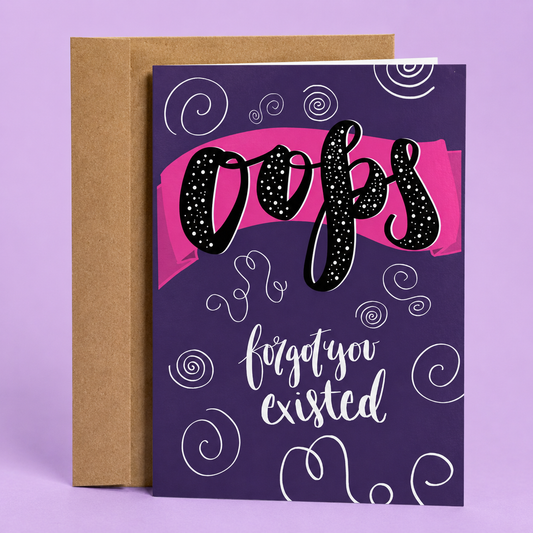 Sleazy Greetings funny friendship greeting card featuring bold decorative typography on a purple background with swirly doodles and the sarcastic message “Oops, Forgot You Existed,” displayed with a kraft envelope for a humorous birthday card, belated birthday card, friendship card, or funny card for friends, coworkers, siblings, and loved ones.