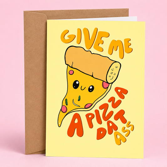 Sleazy Greetings funny food-themed love card featuring an adorable smiling slice of pizza topped with pepperoni and a pickle on a soft yellow background. The card reads, “Give Me a Pizza Drass,” a playful pizza pun with a romantic twist, and is displayed with a kraft envelope against a pink backdrop.