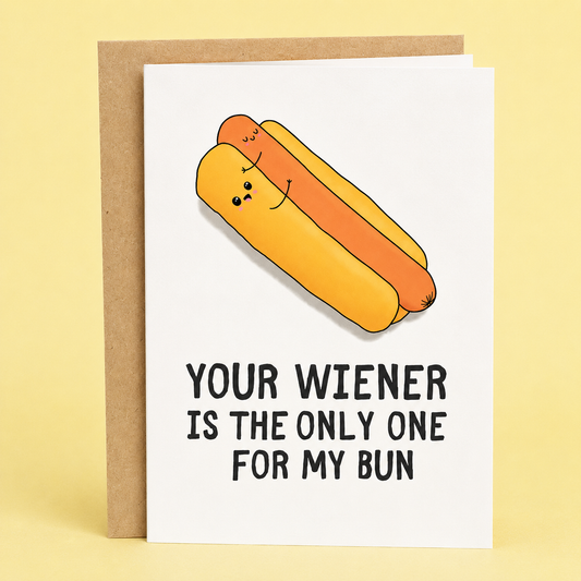 Sleazy Greetings funny love card featuring an adorable hot dog cuddling inside a bun and the phrase “Your Wiener Is the Only One for My Bun,” a playful Valentine's Day, anniversary, wedding, engagement, or just-because card for husbands, wives, boyfriends, girlfriends, fiancés, or partners who appreciate cute illustrations, cheesy puns, and a little romantic humor.