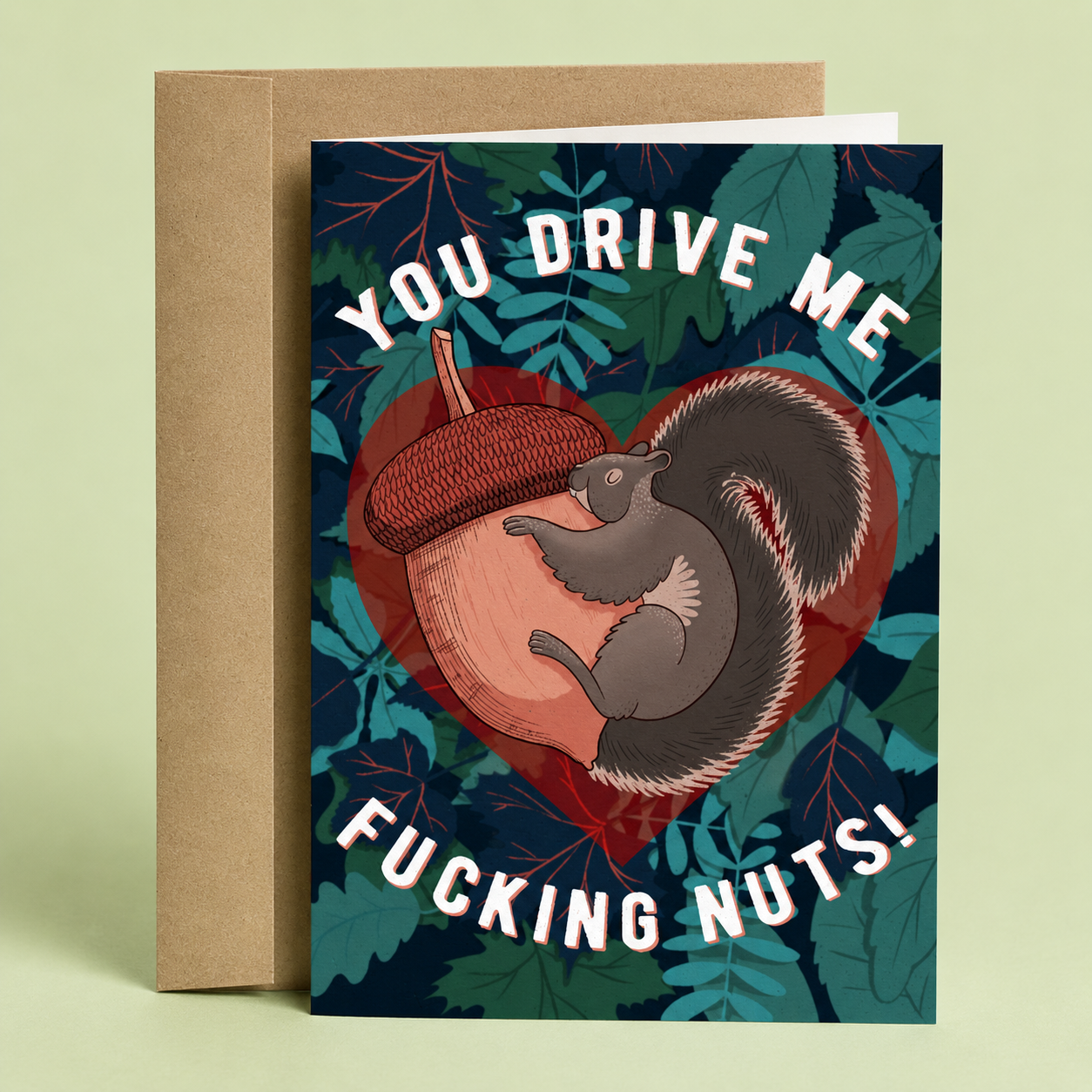 Sleazy Greetings love card featuring a squirrel hugging an acorn inside a heart with the phrase "You Drive Me Fucking Nuts," funny romantic greeting card perfect for Valentine's Day, anniversaries, husbands, wives, girlfriends, boyfriends, spouses, and partners who appreciate sarcastic humor, woodland animals, playful love notes, and cheeky relationship jokes.