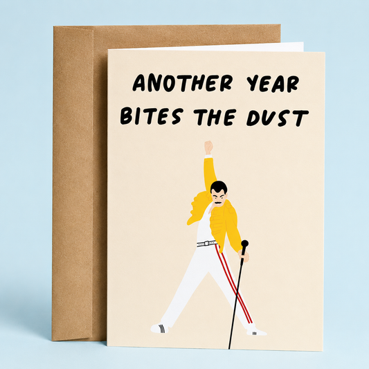 Sleazy Greetings funny birthday card featuring a Freddie Mercury-inspired illustration and the phrase “Another Year Bites the Dust,” a humorous birthday card for music lovers, friends, family, coworkers, husband, wife, boyfriend, or girlfriend.
