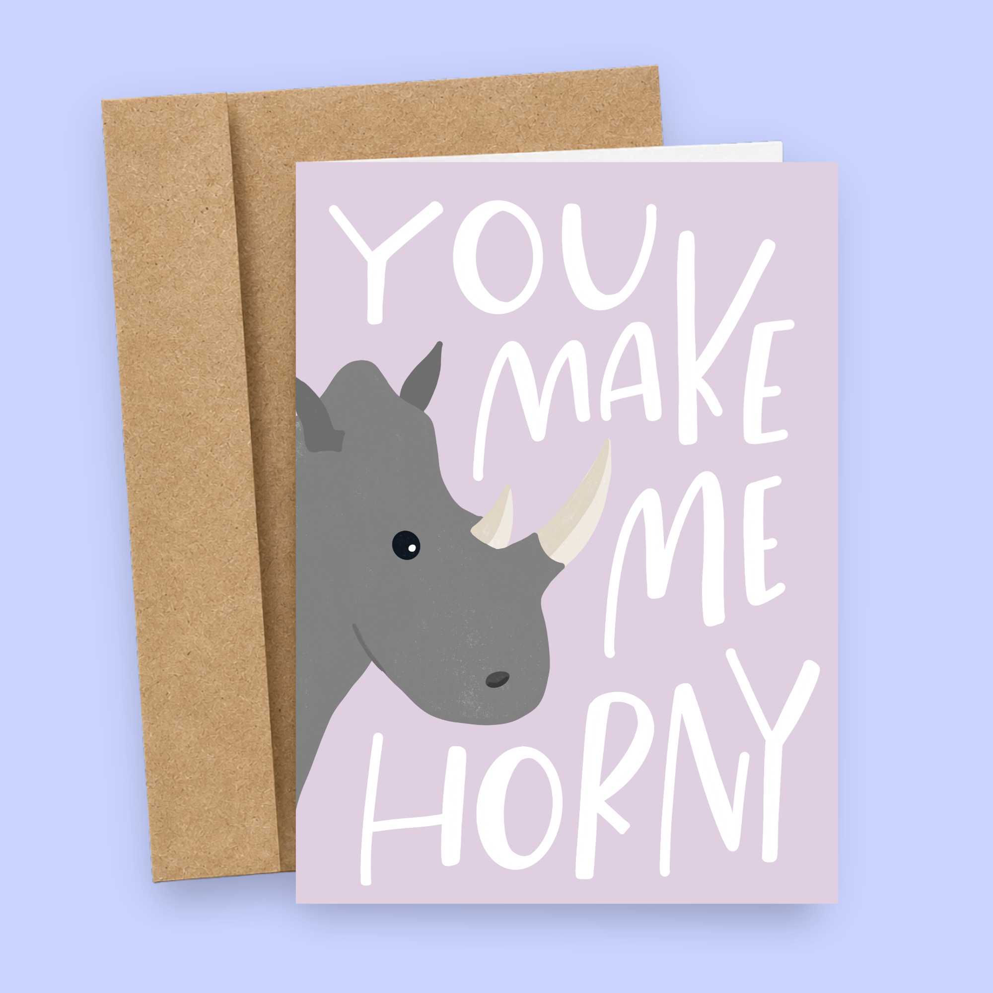 Sleazy Greetings funny love greeting card featuring a rhinoceros illustration and the phrase “You Make Me Horny,” a humorous Valentine's Day, anniversary, wedding, or romantic relationship card for boyfriend, girlfriend, husband, wife, or partner.