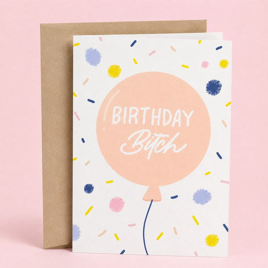 Sleazy Greetings funny birthday greeting card featuring a pastel pink balloon surrounded by colorful confetti with the bold message “Birthday Bitch” on a white background, displayed with a kraft envelope for a humorous birthday card perfect for best friends, sisters, coworkers, wives, girlfriends, and birthday queens.