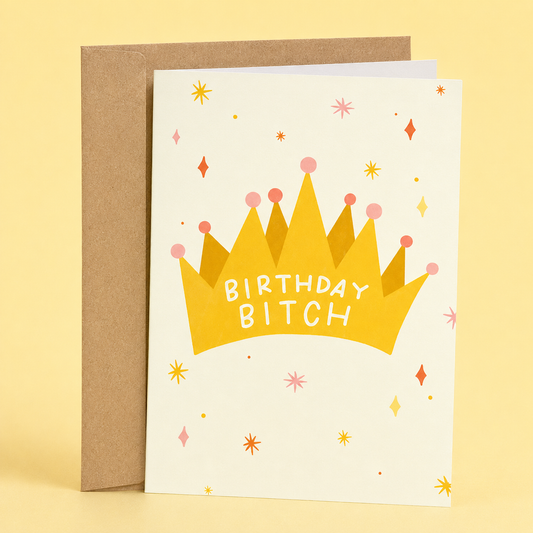 Sleazy Greetings funny birthday greeting card featuring a gold crown surrounded by colorful sparkles with the bold message “Birthday Bitch” on a cream background, displayed with a kraft envelope for a humorous birthday card perfect for best friends, sisters, wives, girlfriends, and queens on their special day.