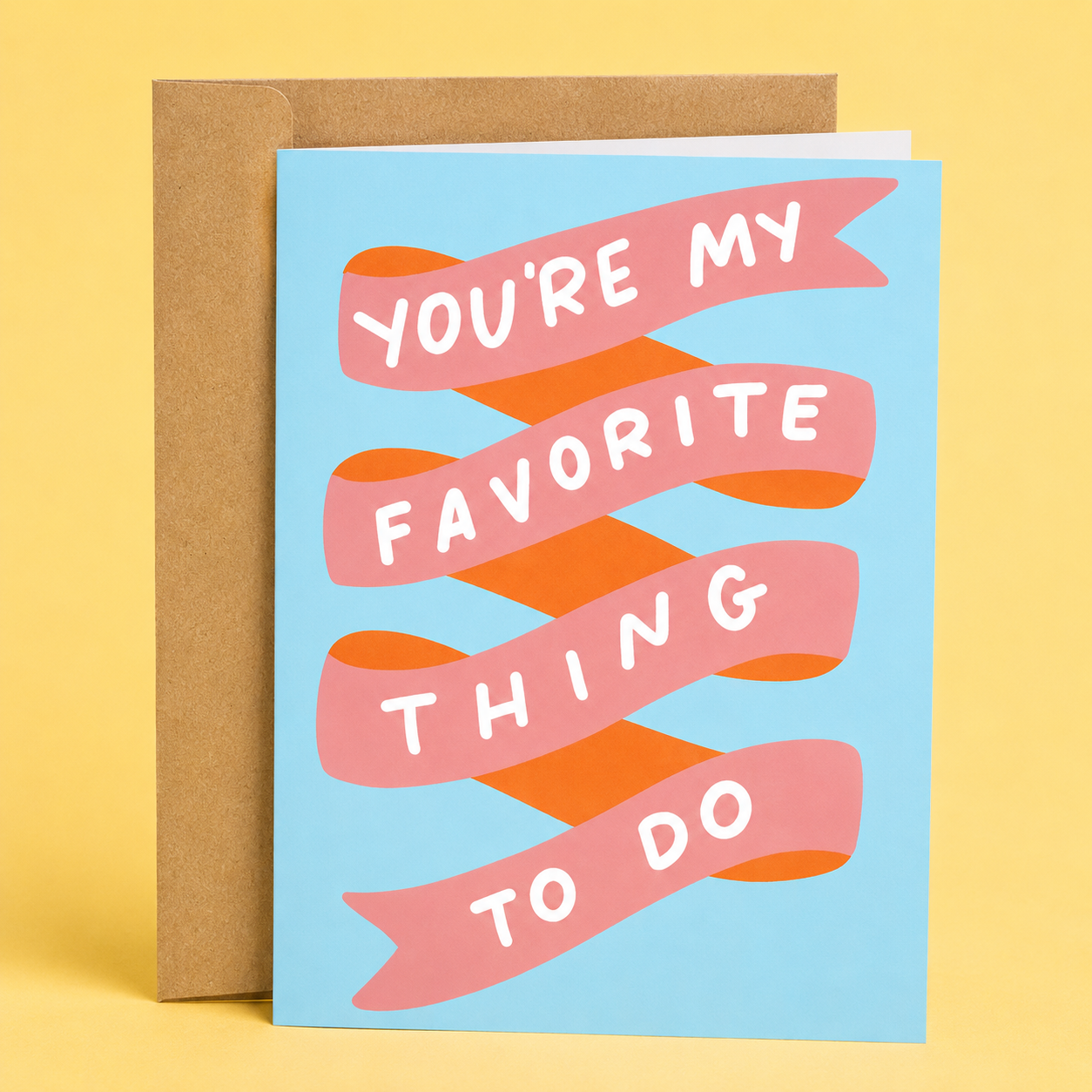 Sleazy Greetings romantic greeting card featuring a pink ribbon banner on a light blue background with the affectionate message “You’re My Favorite Thing To Do,” displayed with a kraft envelope for an anniversary, Valentine’s Day, wedding, or love card.