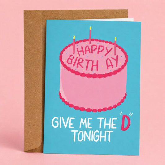 Sleazy Greetings funny adult birthday greeting card featuring a pink birthday cake with candles on a blue background and the cheeky message “Happy Birthday, Give Me the D Tonight,” displayed with a kraft envelope for a humorous birthday card for a partner or spouse.