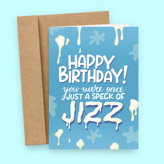 Sleazy Greetings funny adult birthday card featuring a blue background with dripping splatter graphics and bold white lettering, with the outrageous joke “Happy Birthday! You Were Once Just a Speck of Jizz,” displayed in front of a kraft envelope.