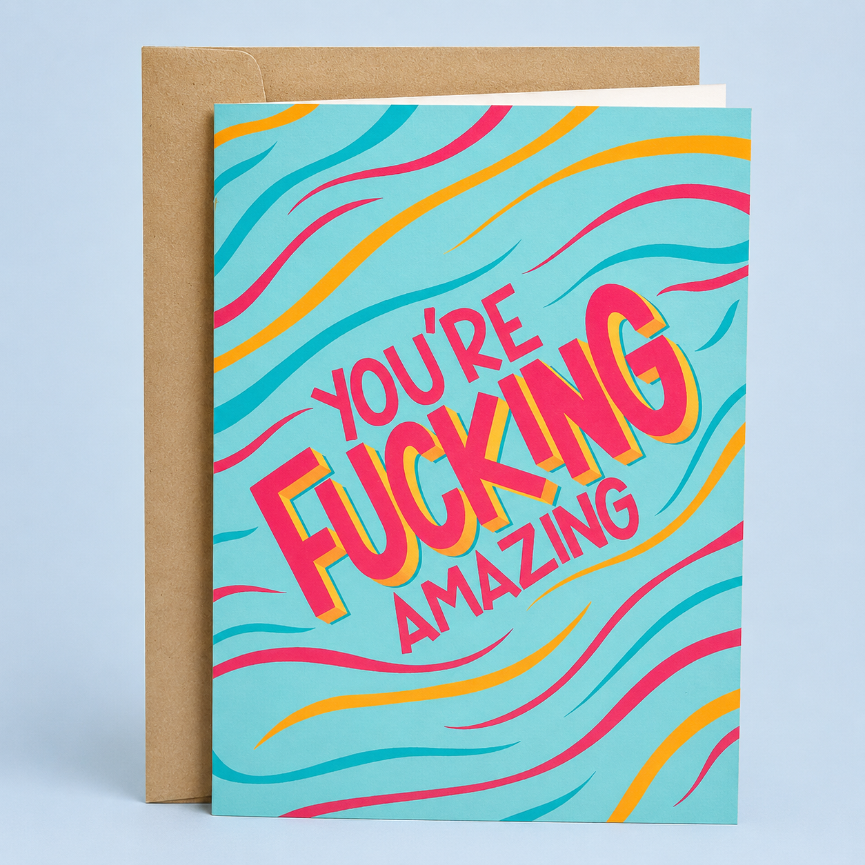 Sleazy Greetings funny appreciation card featuring bold retro-style lettering on a colorful wavy teal background, with the enthusiastic message “You’re Fucking Amazing,” paired with a kraft envelope.