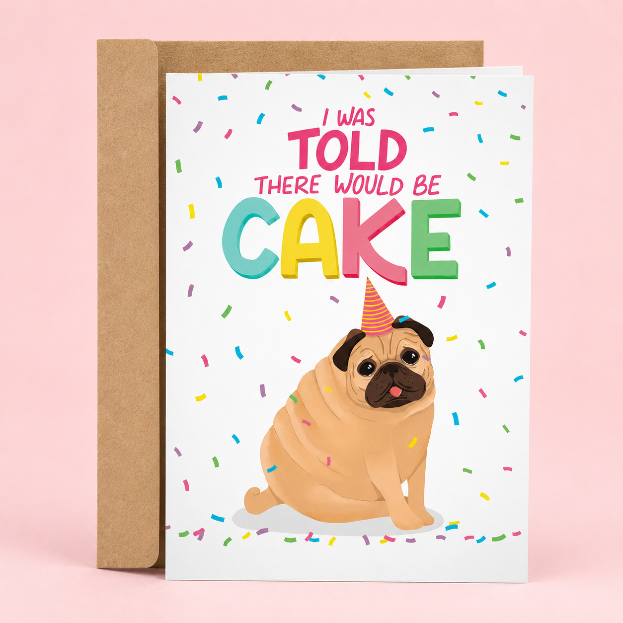 Sleazy Greetings funny birthday card featuring a sad-looking pug wearing a party hat surrounded by colorful confetti, with the playful message “I Was Told There Would Be Cake,” paired with a kraft envelope.