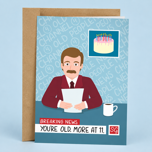 Sleazy Greetings funny birthday card featuring a mustached news anchor delivering a breaking news report, with a birthday cake graphic and the joke “Breaking News: You’re Old. More at 11.” paired with a kraft envelope.