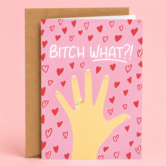 Sleazy Greetings funny engagement card featuring a hand showing off a diamond engagement ring on a pink background filled with red hearts, with the excited message “Bitch What?!,” paired with a kraft envelope.