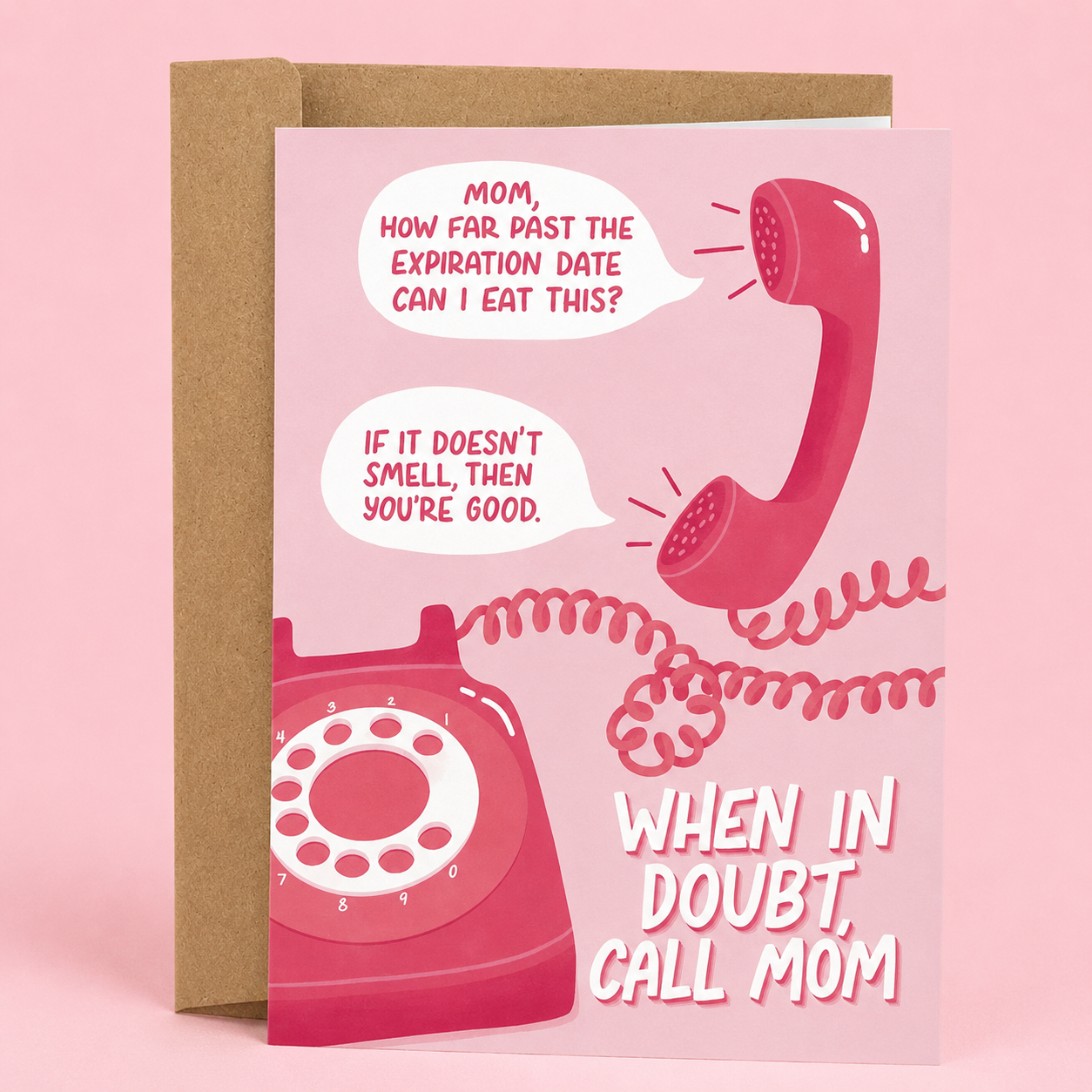 Sleazy Greetings funny Mother’s Day card featuring a retro pink rotary phone with a humorous conversation about eating expired food and the message “When In Doubt, Call Mom,” paired with a kraft envelope.