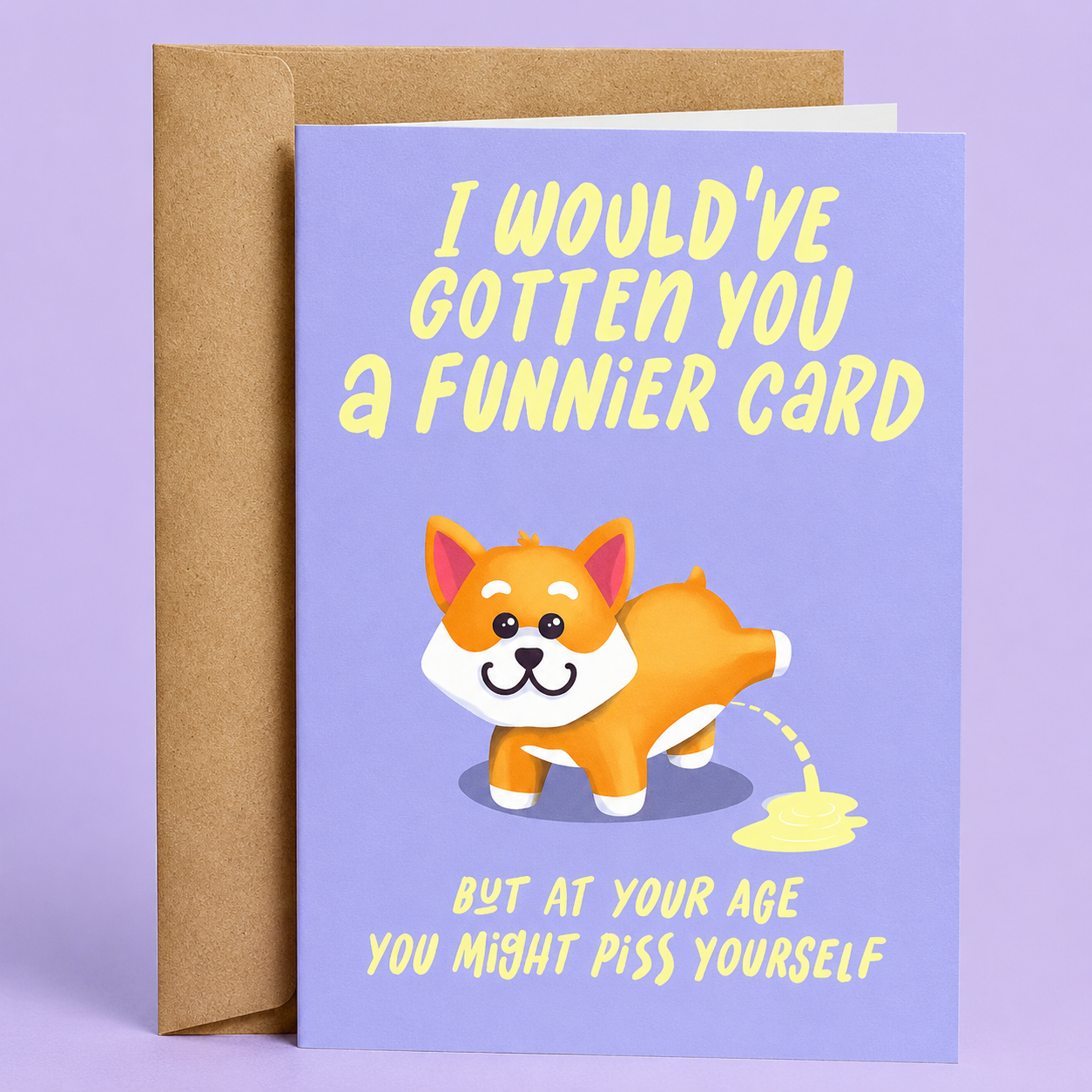 Sleazy Greetings funny birthday card featuring a cute corgi peeing on a purple background with the joke “I Would’ve Gotten You A Funnier Card But At Your Age You Might Piss Yourself,” paired with a kraft envelope.