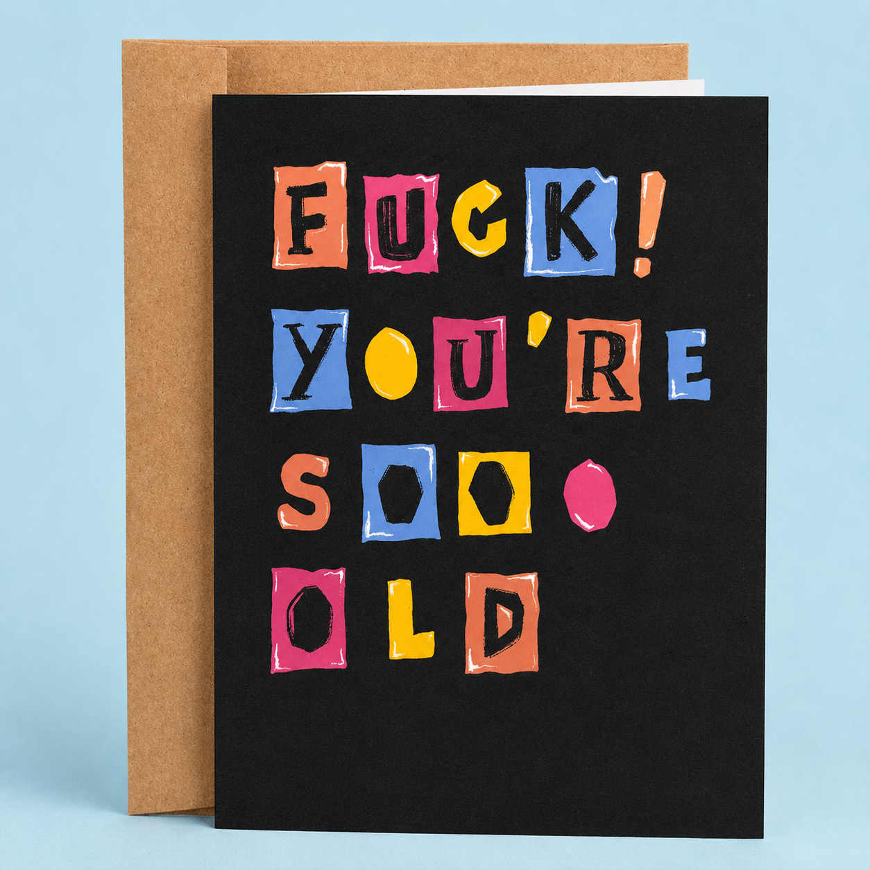 Sleazy Greetings funny birthday card featuring colorful ransom-note style lettering on a black background with the message “Fuck! You’re Soo Old,” paired with a kraft envelope.