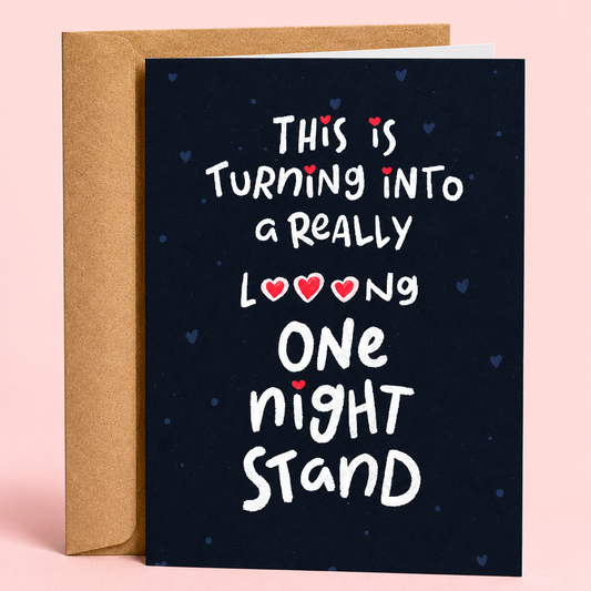 Sleazy Greetings funny anniversary and relationship greeting card featuring white hand-lettered text on a dark navy background that reads “This Is Turning Into A Really Loooong One Night Stand,” decorated with small hearts and paired with a kraft envelope.