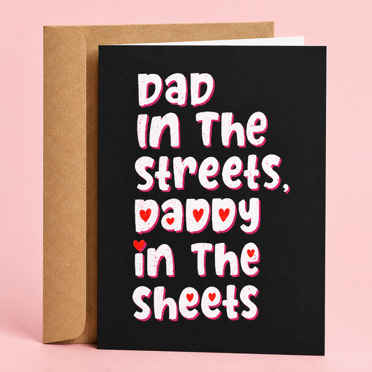 Sleazy Greetings funny Father’s Day greeting card featuring bold white and pink lettering on a black background that reads “Dad In The Streets, Daddy In The Sheets,” paired with a kraft envelope.
