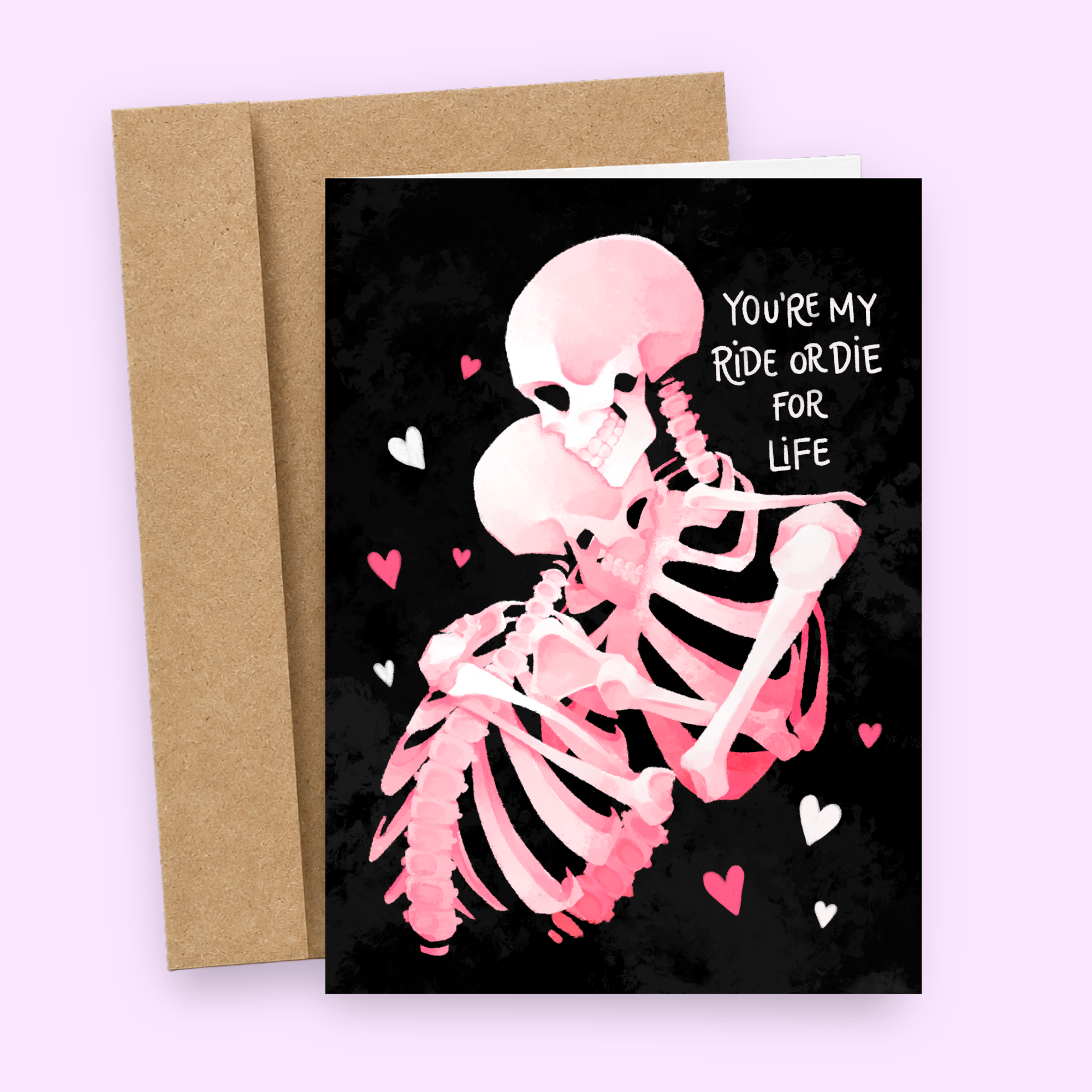 Sleazy Greetings gothic love or Valentine’s Day card featuring two embracing pink skeletons with “You’re My Ride Or Die For Life” sentiment, combining dark romance, spooky soulmate humor, skeleton couple artwork, and alternative love aesthetics on premium matte cardstock with kraft envelope.