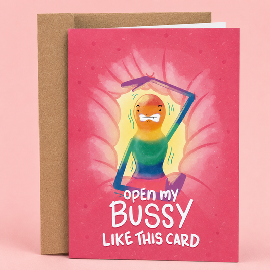 Sleazy Greetings funny adult love or anniversary card featuring “Open My Bussy Like This Card” humor with rainbow-colored character illustration, outrageous LGBTQ+ innuendo comedy, and bold cheeky adult humor on premium matte cardstock with kraft envelope.