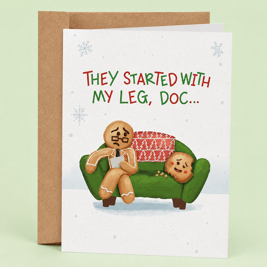 Sleazy Greetings funny Christmas card featuring “They Started With My Leg, Doc…” humor with terrified gingerbread cookie illustration, dark holiday comedy, and cute cannibal cookie joke design on premium matte cardstock with kraft envelope.