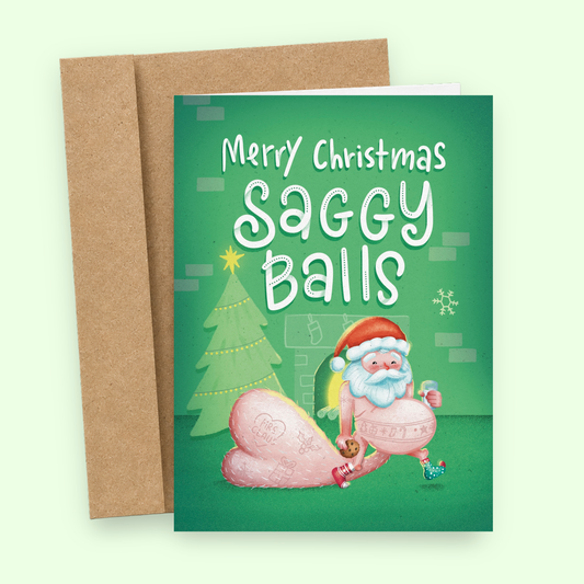 Sleazy Greetings funny Christmas card featuring “Merry Christmas Saggy Balls” humor with ridiculous Santa ball sack illustration, outrageous adult holiday comedy, and absurd festive artwork on premium matte cardstock with kraft envelope.
