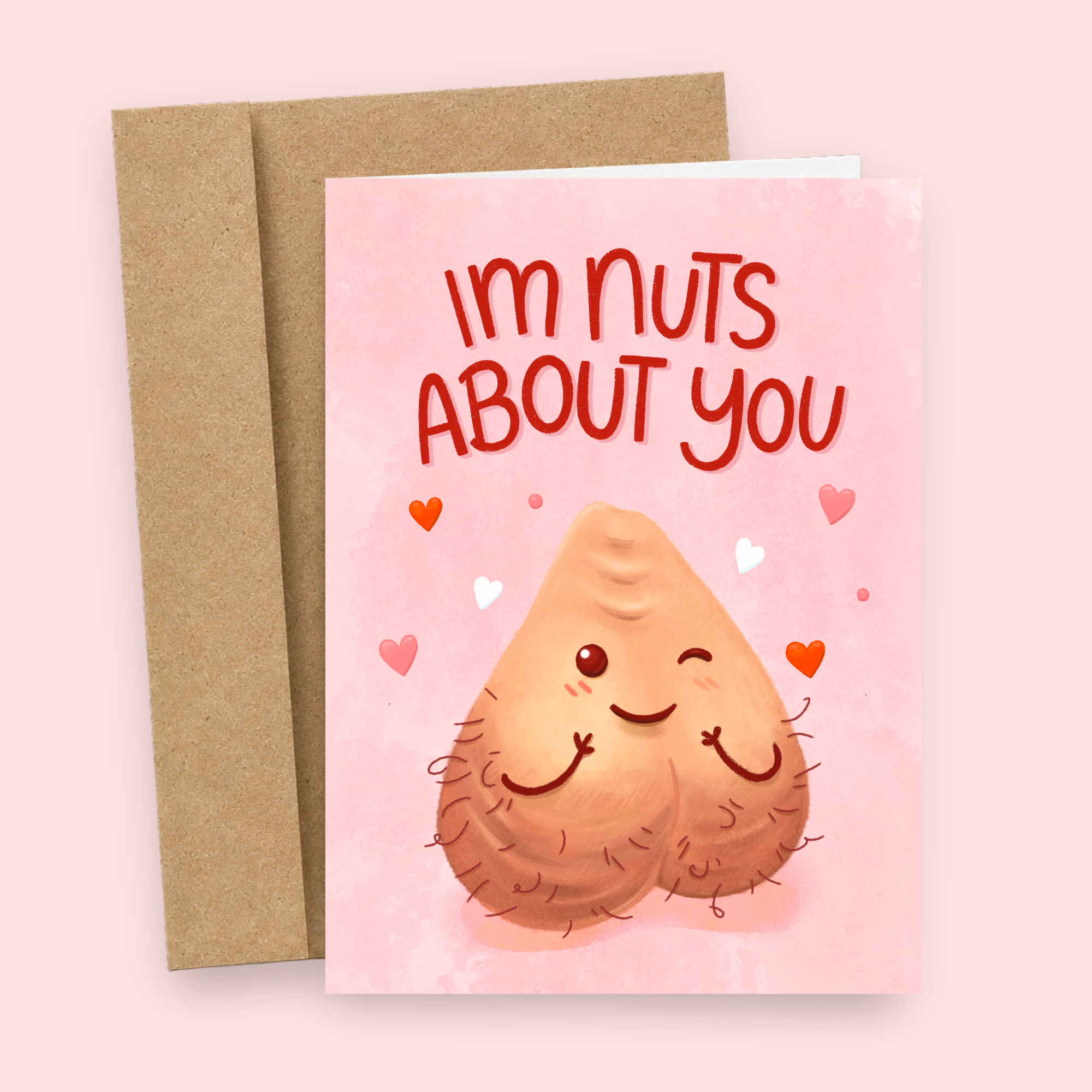 Sleazy Greetings funny love or Valentine’s Day card featuring “I’m Nuts About You” humor with adorable anthropomorphic hairy balls illustration, cheeky romantic comedy, and cute inappropriate pun design on premium matte cardstock with kraft envelope.