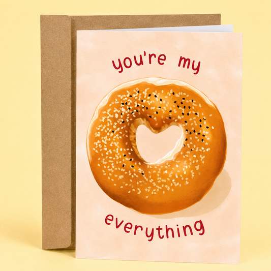 Sleazy Greetings funny love or Valentine’s Day card featuring “You’re My Everything” bagel pun humor with heart-shaped everything bagel illustration, cute foodie romance, and playful minimalist love design on premium matte cardstock with kraft envelope.