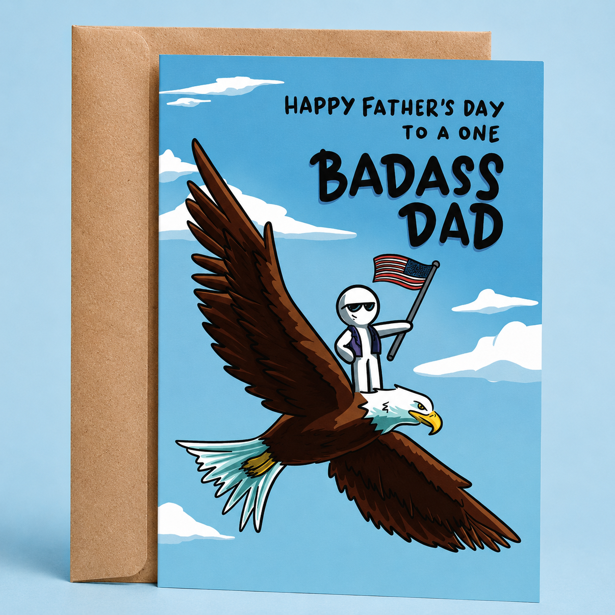 Sleazy Greetings funny Father’s Day card featuring “Happy Father’s Day to a one badass dad” humor with patriotic eagle-riding illustration and American flag design on premium matte cardstock with kraft envelope.