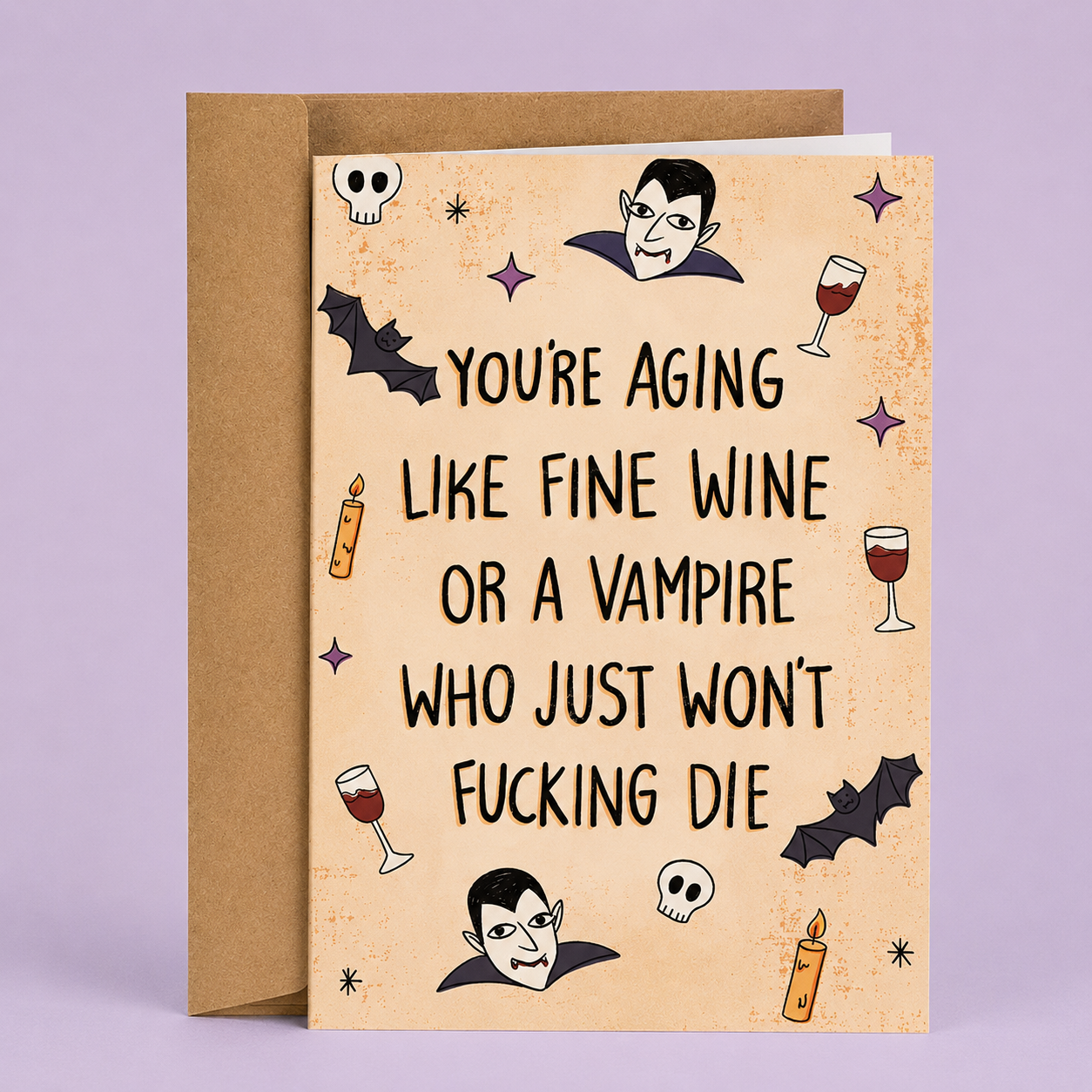 Sleazy Greetings funny Halloween birthday card featuring “You’re aging like fine wine or a vampire who just won’t fucking die” humor with vampire, bat, and wine illustration on premium matte cardstock with kraft envelope.