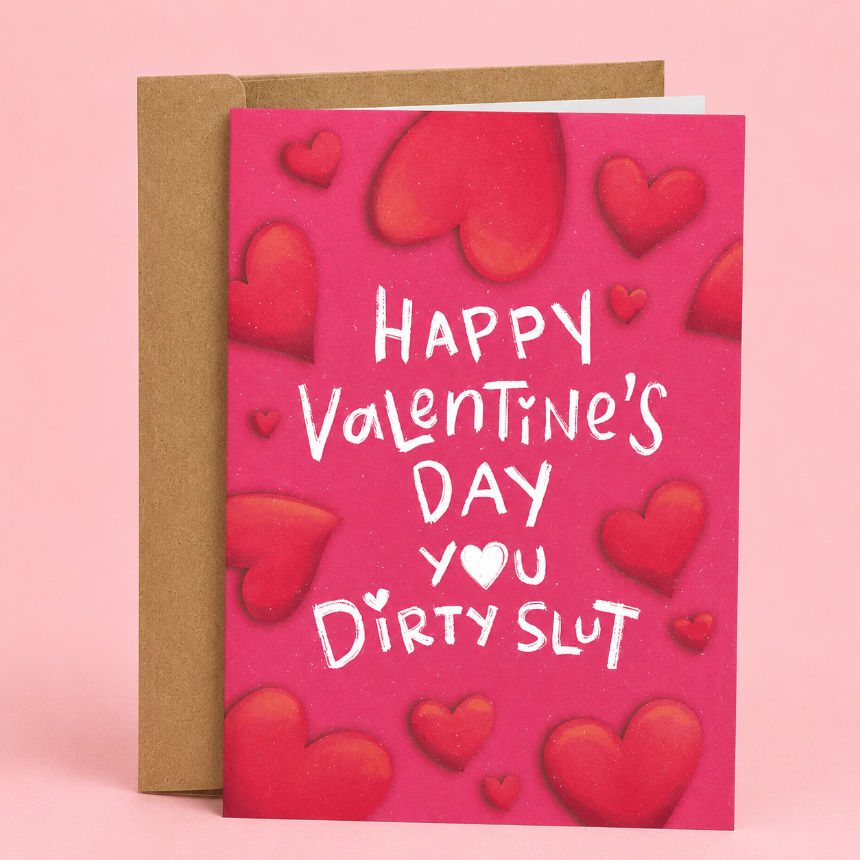 Sleazy Greetings funny adult Valentine’s Day card featuring “Happy Valentine’s Day You Dirty Slut” humor with pink heart illustration design on premium matte cardstock with kraft envelope.