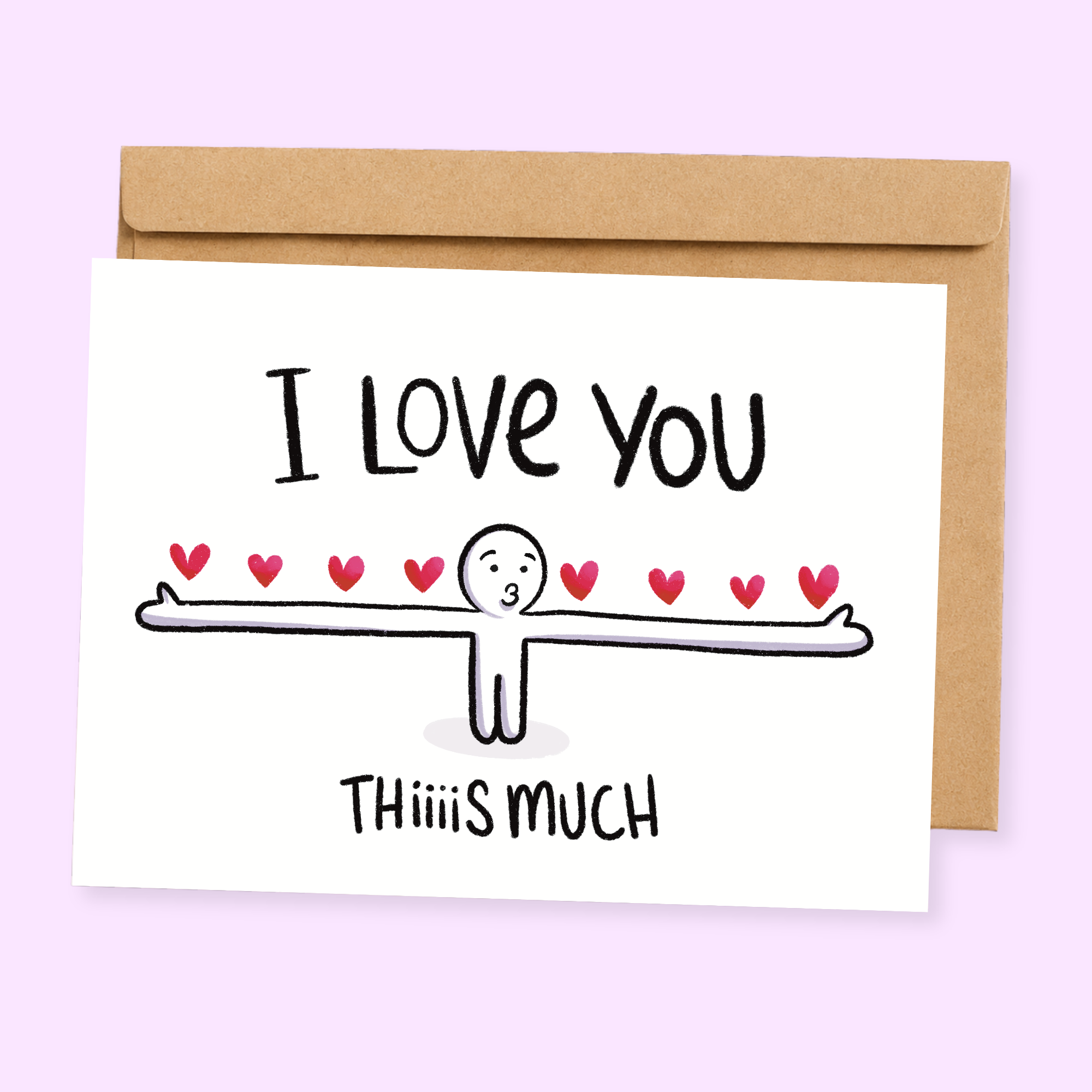 A greeting card with a cartoon illustration of a character saying 'I love you this much' surrounded by hearts, with the text 'This is much' on the bottom right. The card has a light background and is paired with a beige kraft envelope.